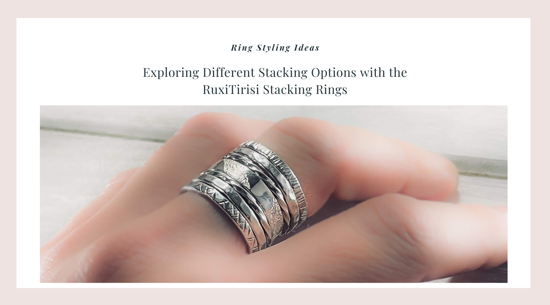 seven sterling silver stacking rings with various widths and textures modeled on a finger