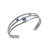 Faceted topaz gemstones in sterling silver cuff bracelet