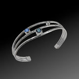 Faceted topaz gemstones in sterling silver cuff bracelet