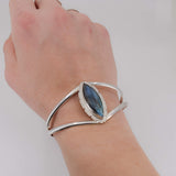 Marquise shaped labradorite cuff bracelet worn on wrist