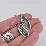 Sterling Silver Labradorite Dangle Earrings Shown in Hand for Scale