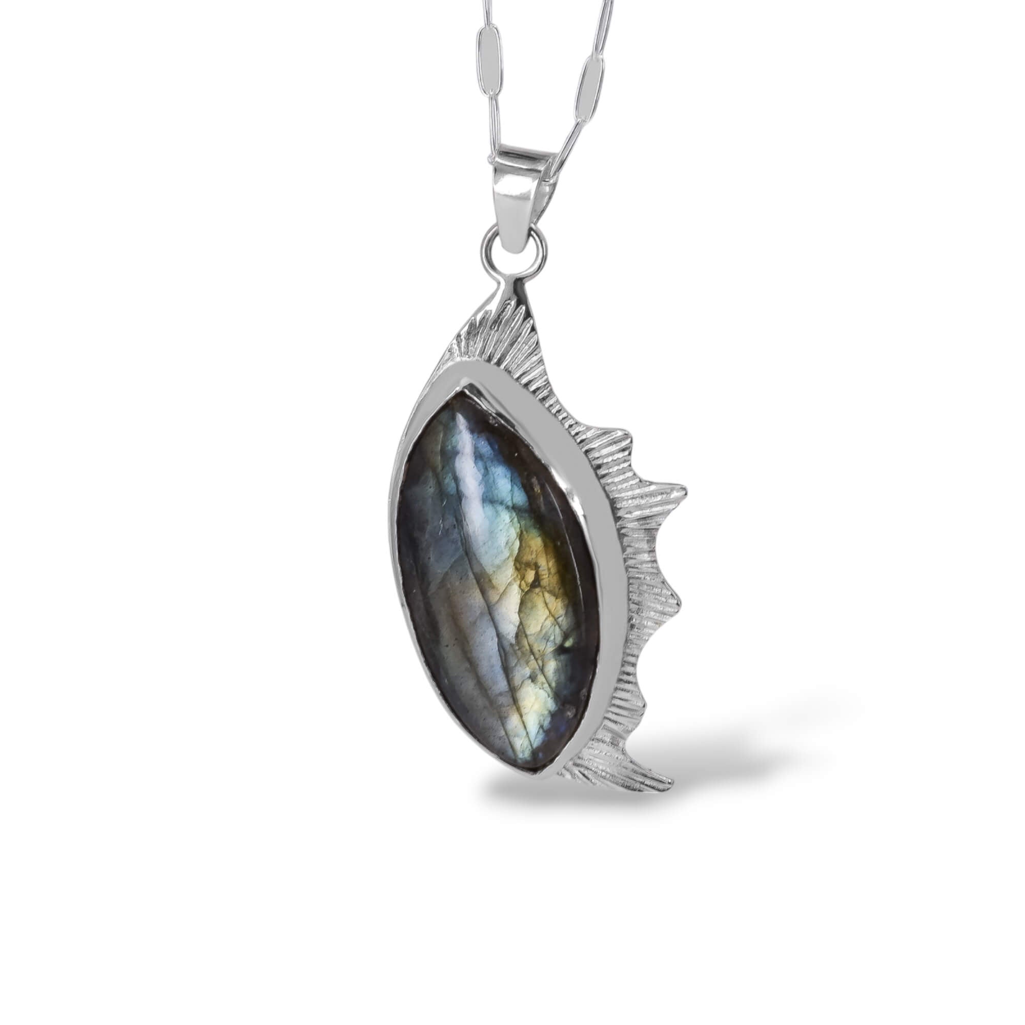 Sterling Silver Labradorite Pendant with a Marquise Shaped stone and a unique one of a kind border on the one side. 