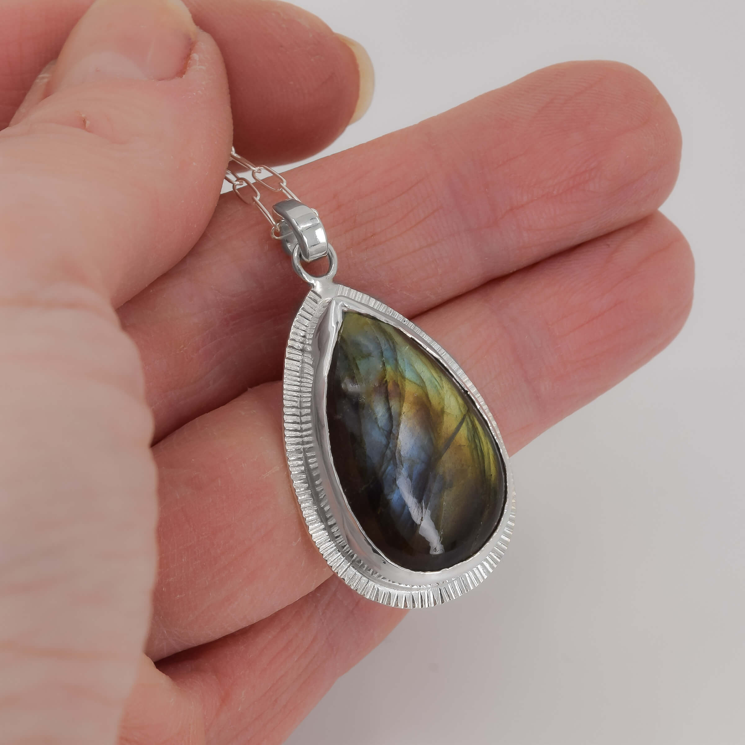 Sterling Silver Labradorite Pendant V in hand
