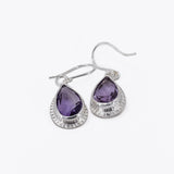 Sterling silver amethyst drop earrings with textured border.