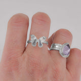Sterling silver butterfly ring worn on finger